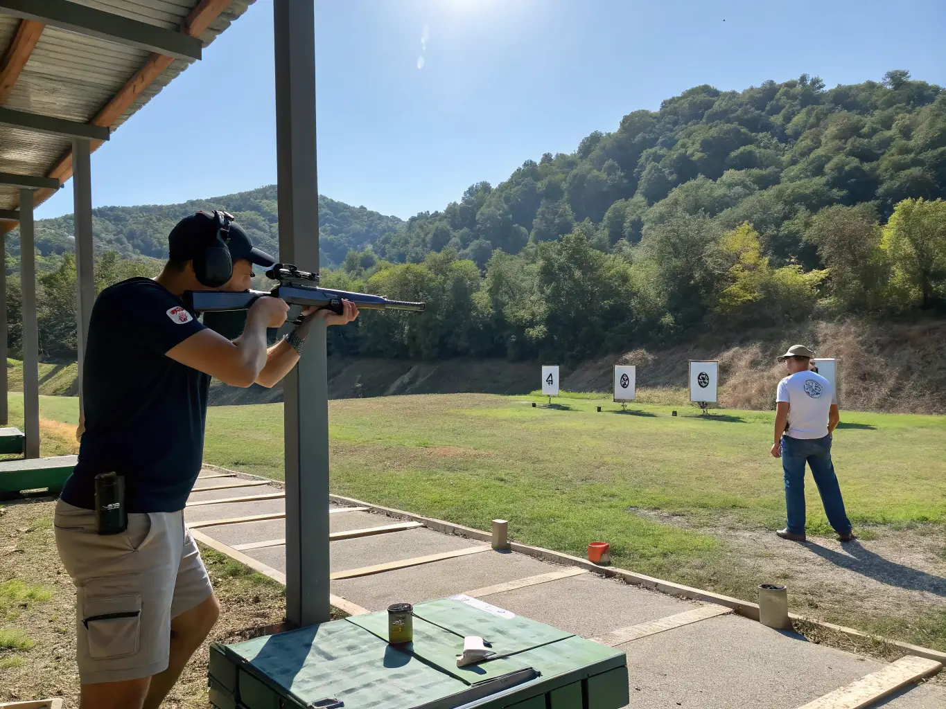 A photograph of a shooting instructor providing guidance to a participant during an ATSK training session, emphasizing safety and skill development.